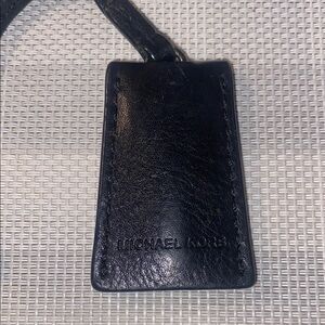 Michael Kors Tag w/ Key Inside